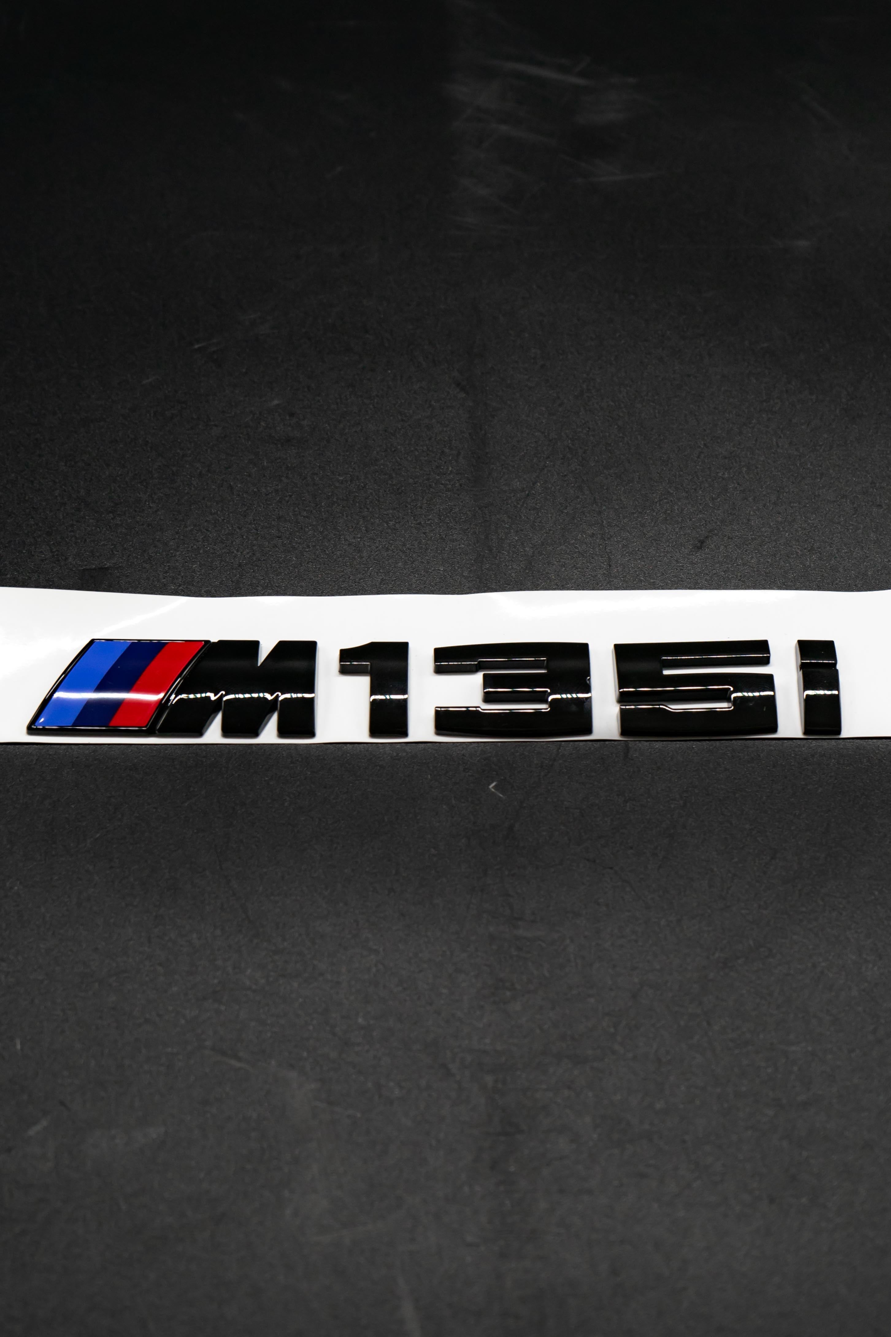 BMW Genuine Gloss Black M135i Badge