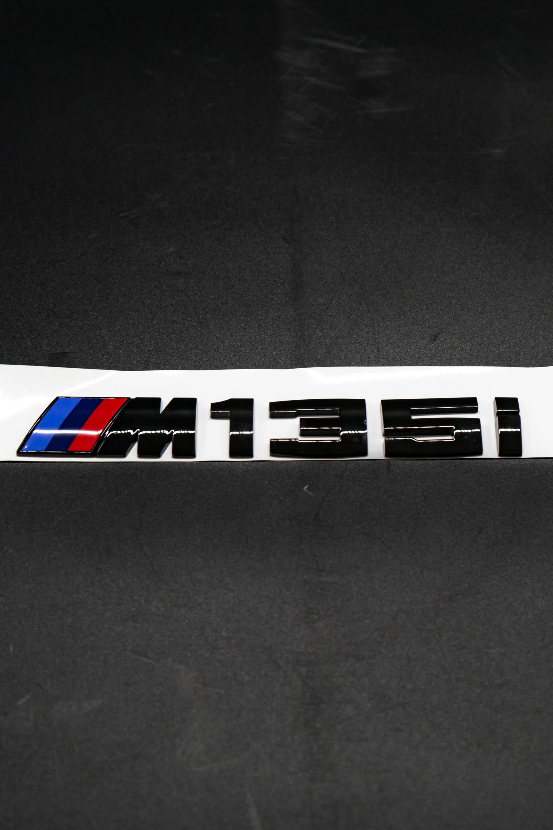 BMW Genuine Gloss Black M135i Badge