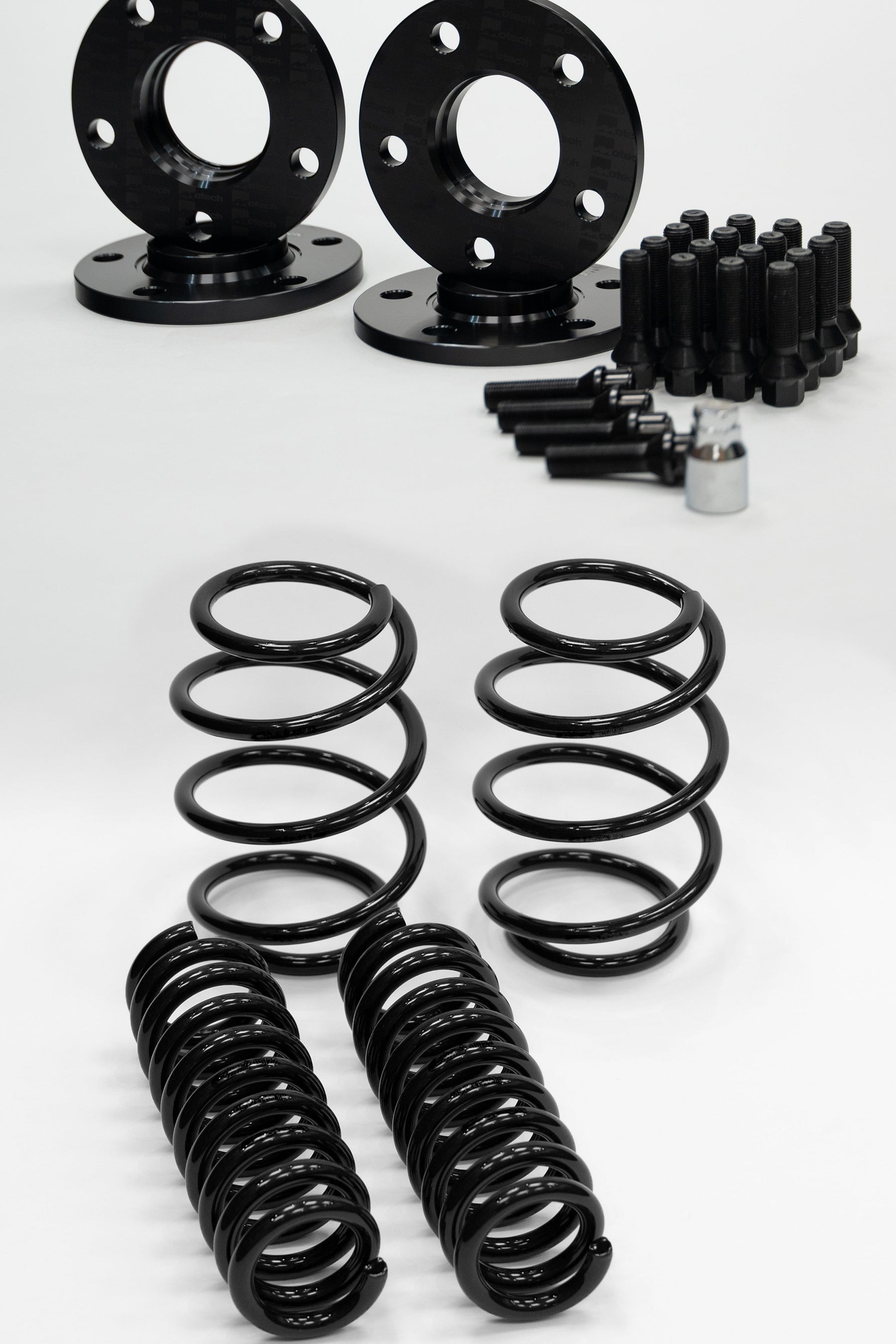 Black Motech Spacers, Eibach Springs, bolts & lockers.