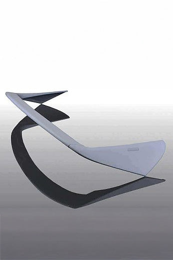 Car spoiler on a reflective surface with a white background