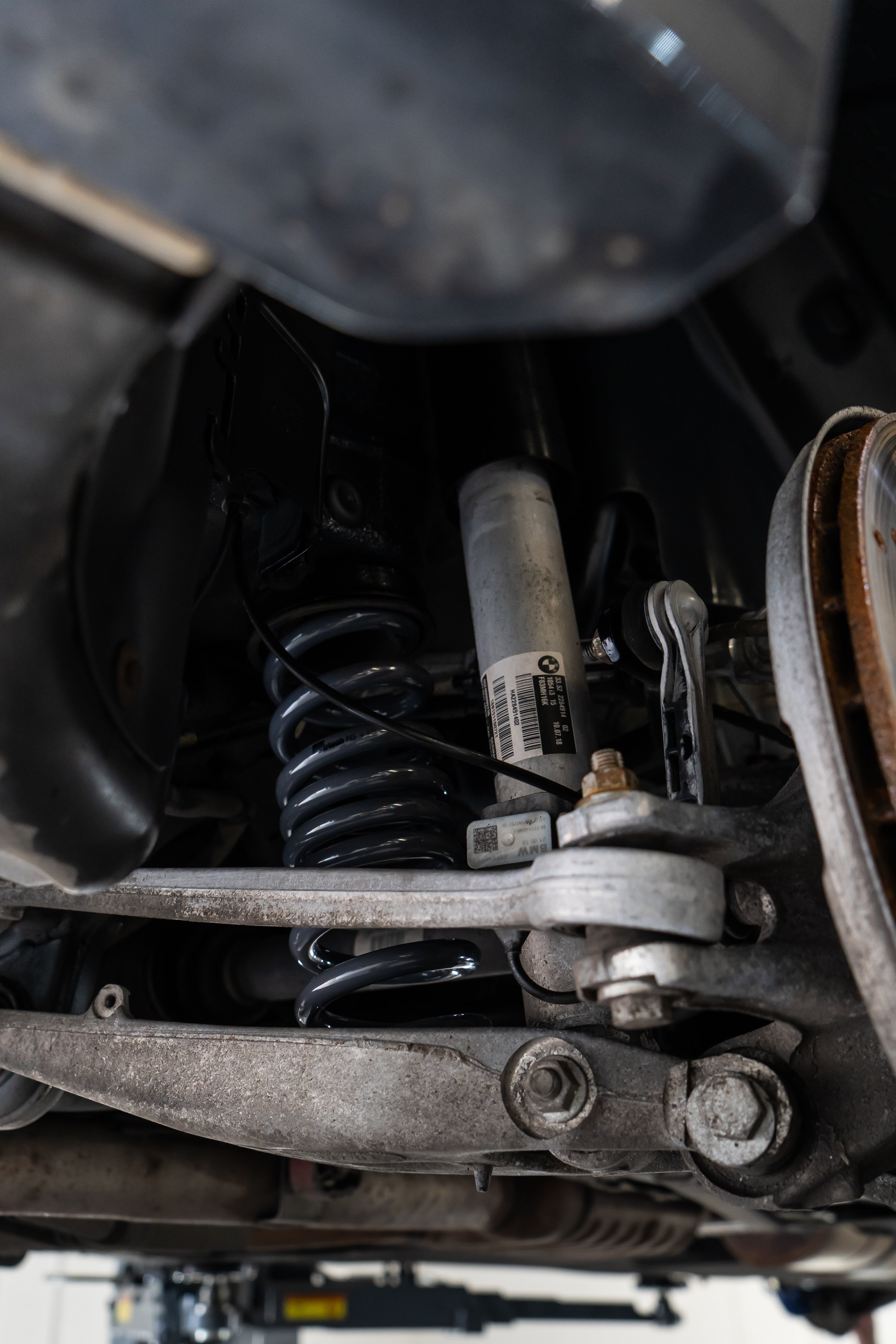 Close-up of a Motech Stance spring fitted to a BMW.