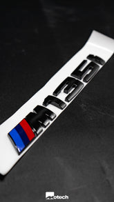 BMW Genuine Gloss Black M135i Badge