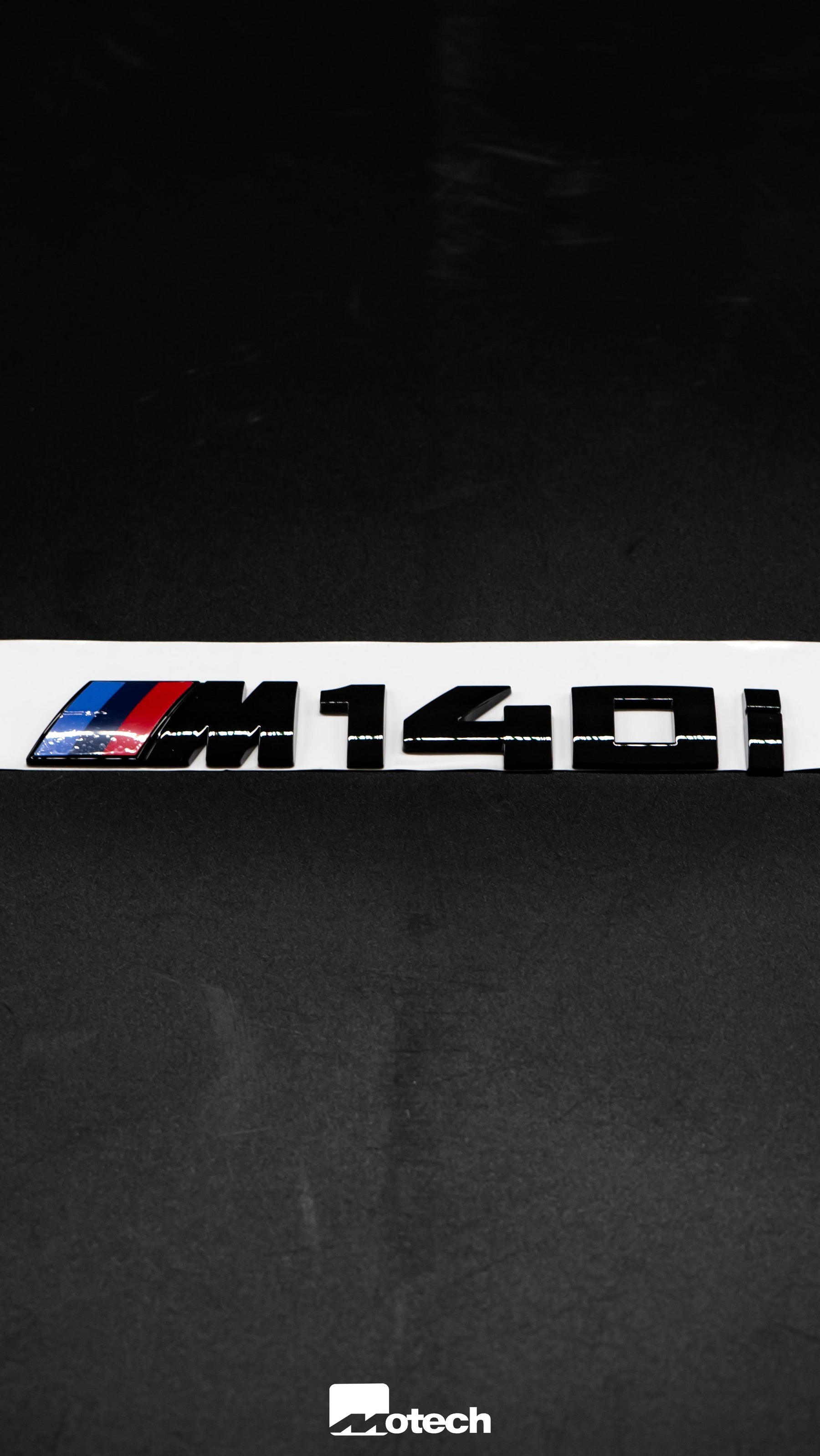 BMW Gloss Black M140i Badge