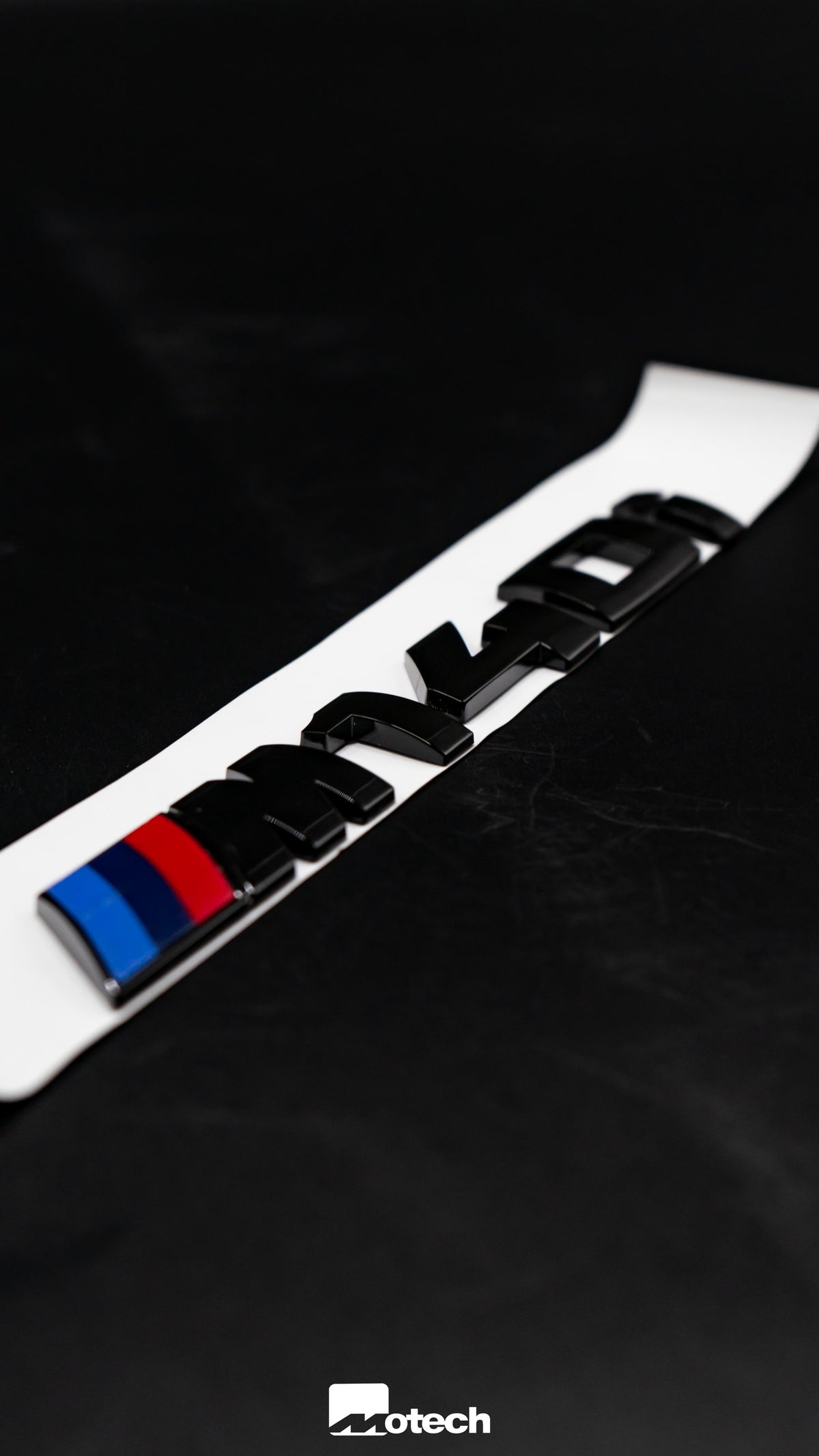 BMW Gloss Black M140i Badge